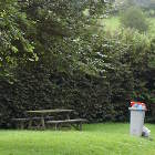Bench and dustbin present