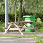 Picnic tables and bins present